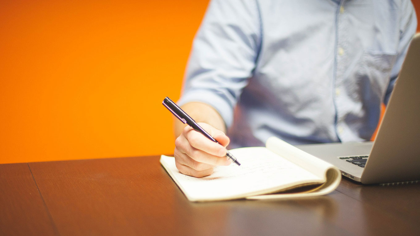Writing in book